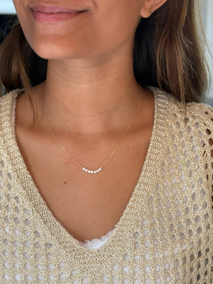 Gold pearl necklace