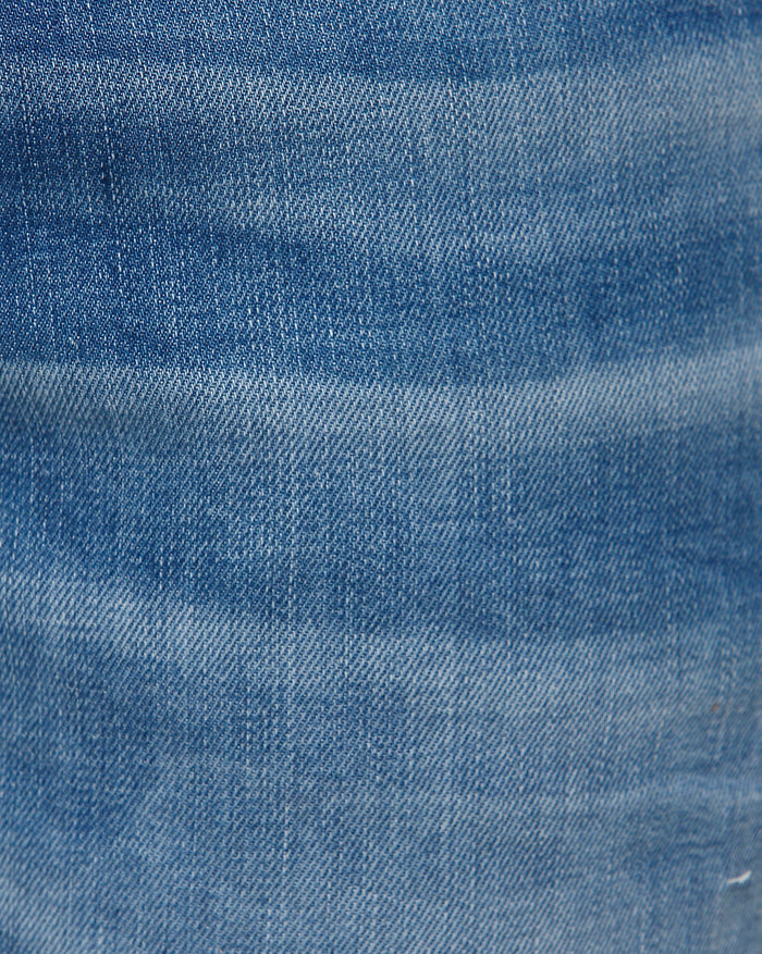 Light Blue Mid Rise Distressed Leon Slim Fit Jeans