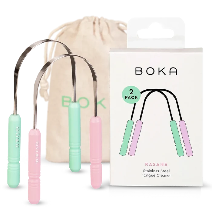 Boka stainless-steel tongue cleaners with packaging and drawstring bag on a white background