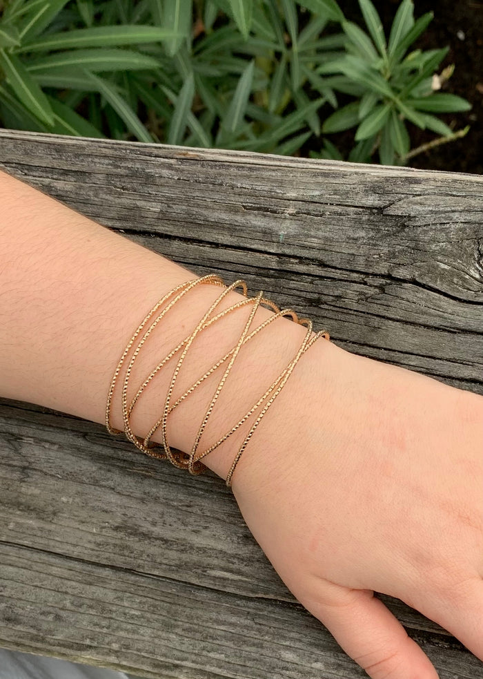 Athea Gold cuff on model