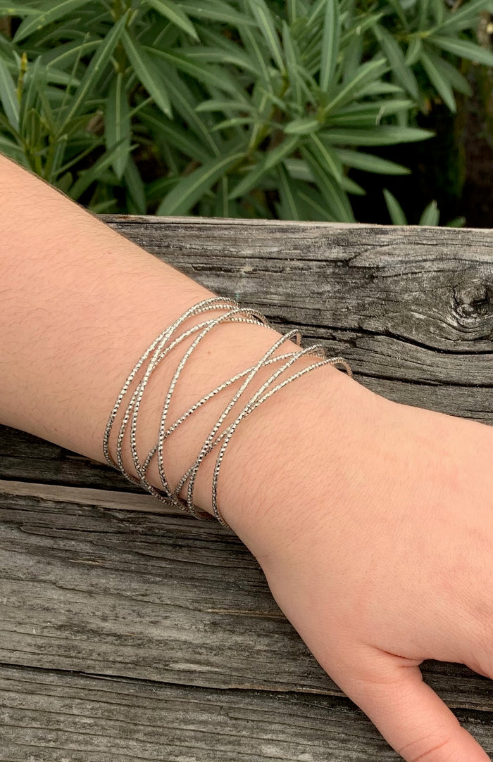 Athea silver cuff on model