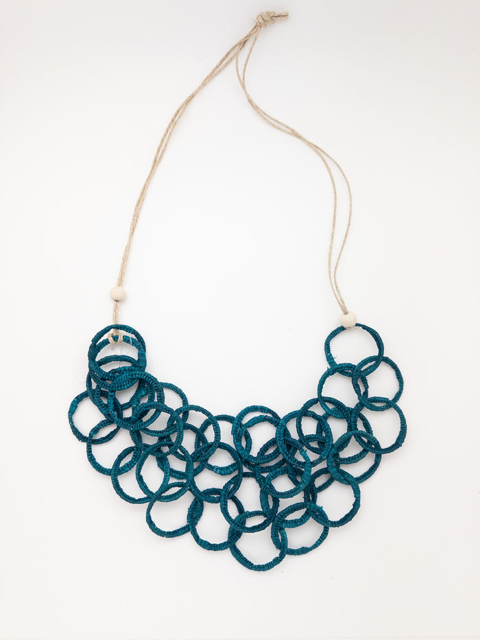 Ayita handmade iraca palm necklace in teal