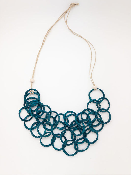 Ayita handmade iraca palm necklace in teal