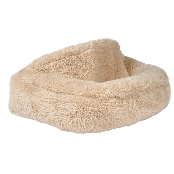 Beige fluffy pet bed on a white background
