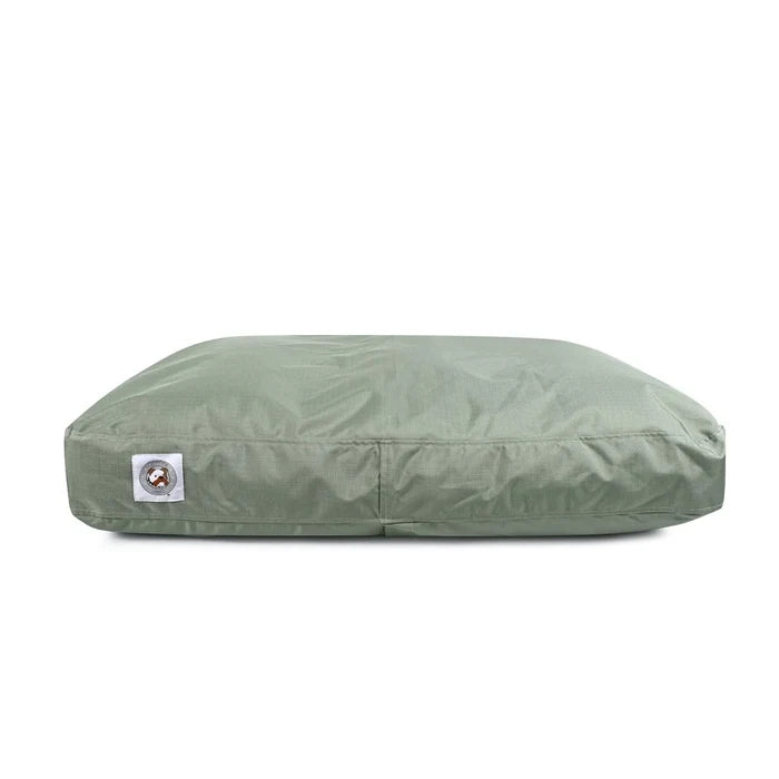 Green pet bed with a brand logo on a white background