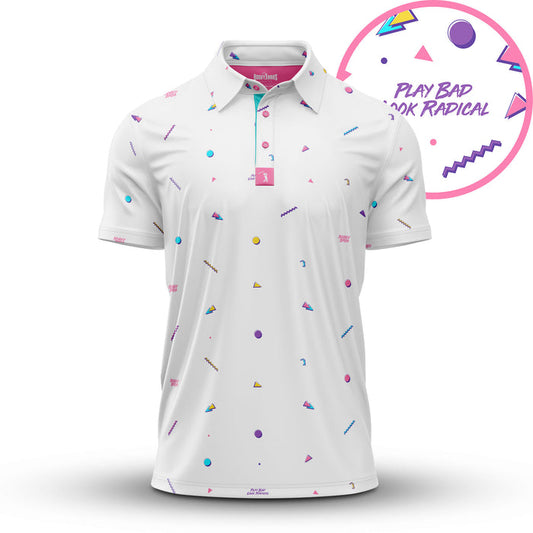 The Chillax - Polo is a white shirt with a vibrant 80s-inspired pattern of pink, blue, and yellow shapes. It has an athletic fit, moisture-wicking fabric, and "PLAY BAD LOOK RADICAL" in purple on pink among the geometric designs.