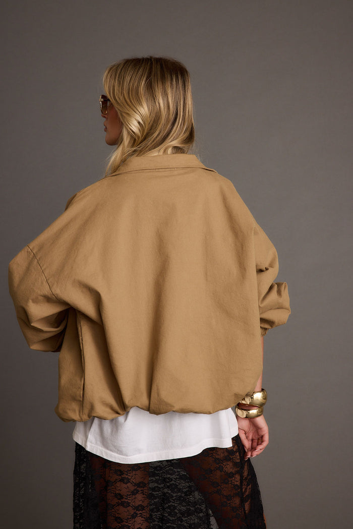 Back view of the jacket showing the silhouette and fit.