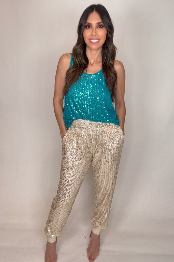 Style the Peacock Blue Sequin Tank Top exclusively at Born To Glam