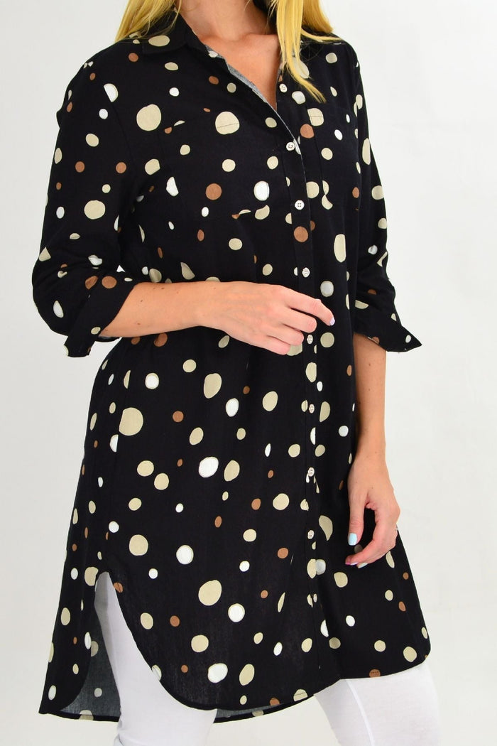 Long black spot tunic shirt by Ruby Rain, featuring a relaxed fit with long sleeves and a stylish, patterned design.