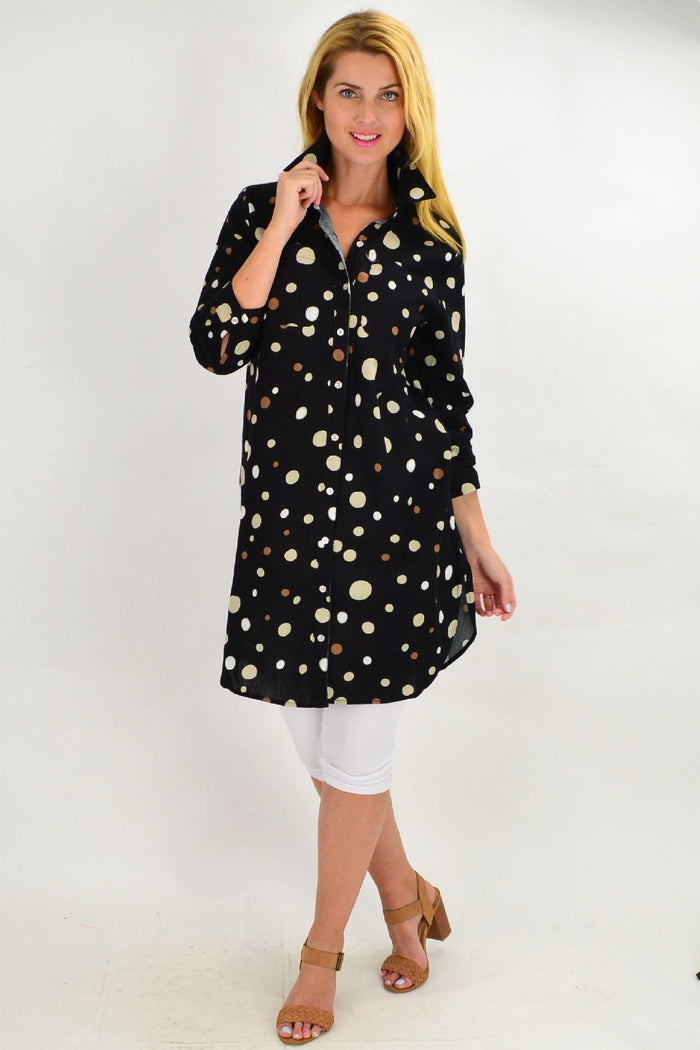 Long black spot tunic shirt by Ruby Rain, featuring a flowy silhouette and subtle dot pattern, suitable for casual or semi-formal wear.