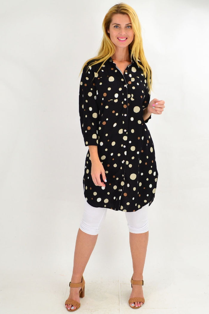 Long black spot tunic shirt by Ruby Rain featuring a relaxed fit, long sleeves, and a stylish spot pattern.