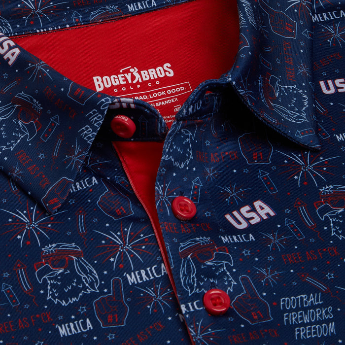 Close-up of the 'Merica - Navy - Polo: an athletic-fit, navy button-up with red buttons and festive U.S.A. prints like fireworks and footballs. Features BOGEY BROS GOLF CO. label, moisture wicking, and UPF 50 for cool comfort and sun protection.