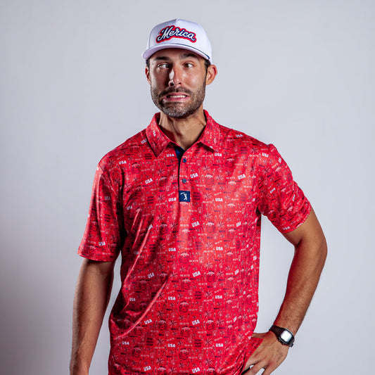 A man in a 'Merica - Red - Polo with athletic fit, a white Merica baseball cap, and a black wristwatch poses against a plain background, making an exaggerated funny face with raised eyebrows and lips pulled back.