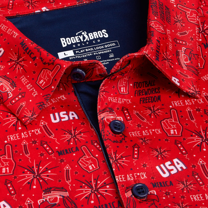 Close-up of the 'Merica - Red - Polo, an athletic fit shirt with blue buttons and patriotic graphics like “USA,” fireworks, and stars. This BOGEY BROS. polo features UPF 50 protection and moisture-wicking for all-day comfort.