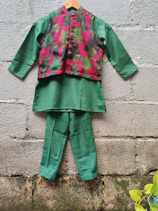 Pink printed satin coat with green kurta and pants