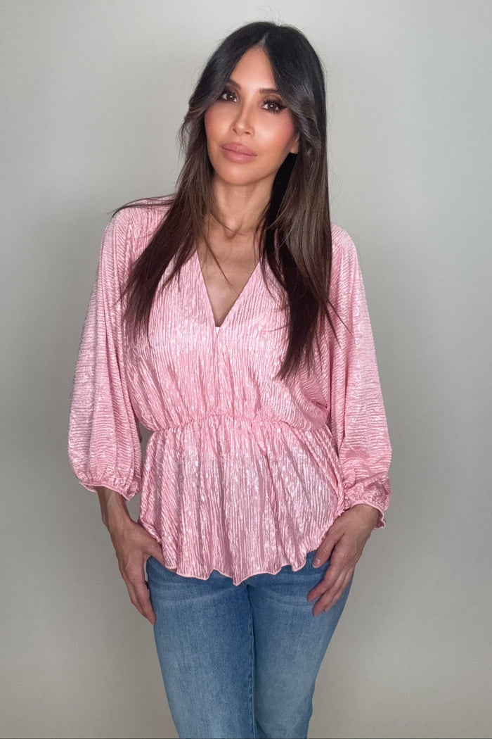 Pink V-neck crinkle satin long sleeve blouse with a paisley print and waist-defining silhouette.