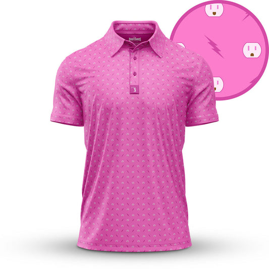 The Shocked - Polo is a pink shirt with small white electrical outlets and zigzag lightning bolts, classic collar, button placket, short sleeves, and UPF 50 protection. An enlarged section shows the playful outlet and bolt pattern.
