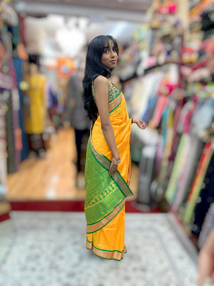 Silk Banarasi Marigold  Yellow With Green With Gold Woven Pattern Saree