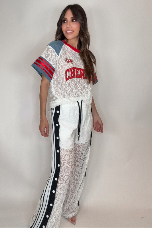 Style the Sporty Lace Snap Pants with Stripes exclusively at Born To Glam