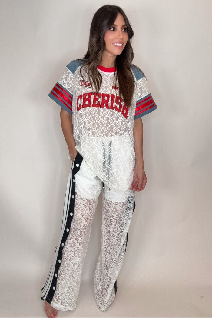Style the Sporty Lace Snap Pants with Stripes exclusively at Born To Glam