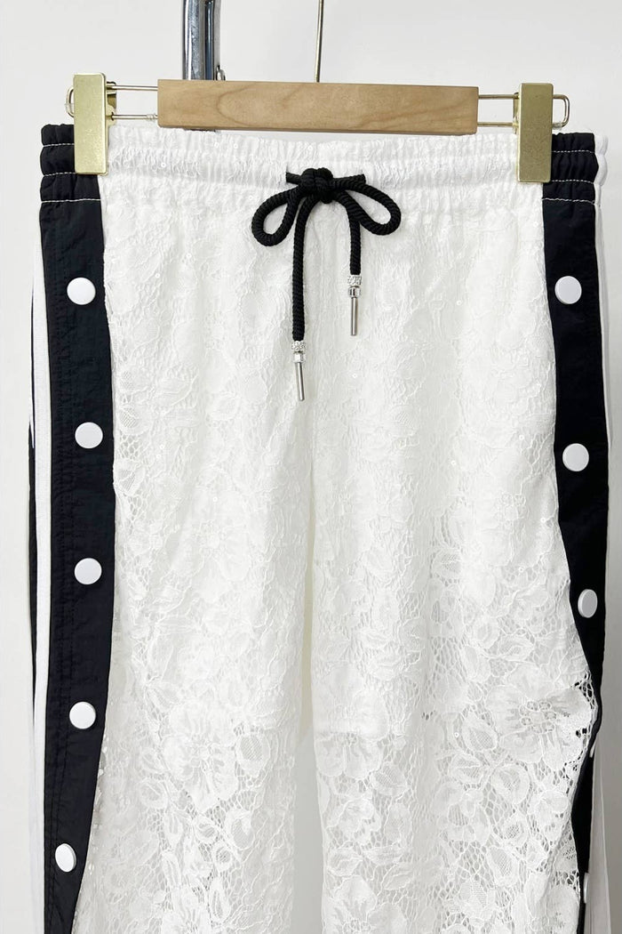 Style the Sporty Lace Snap Pants with Stripes exclusively at Born To Glam