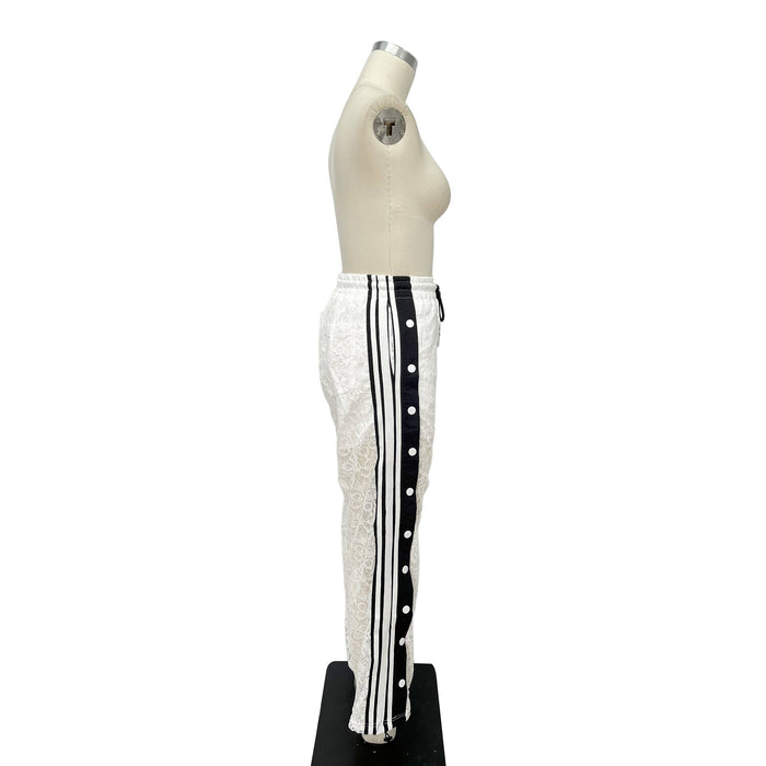 Style the Sporty Lace Snap Pants with Stripes exclusively at Born To Glam