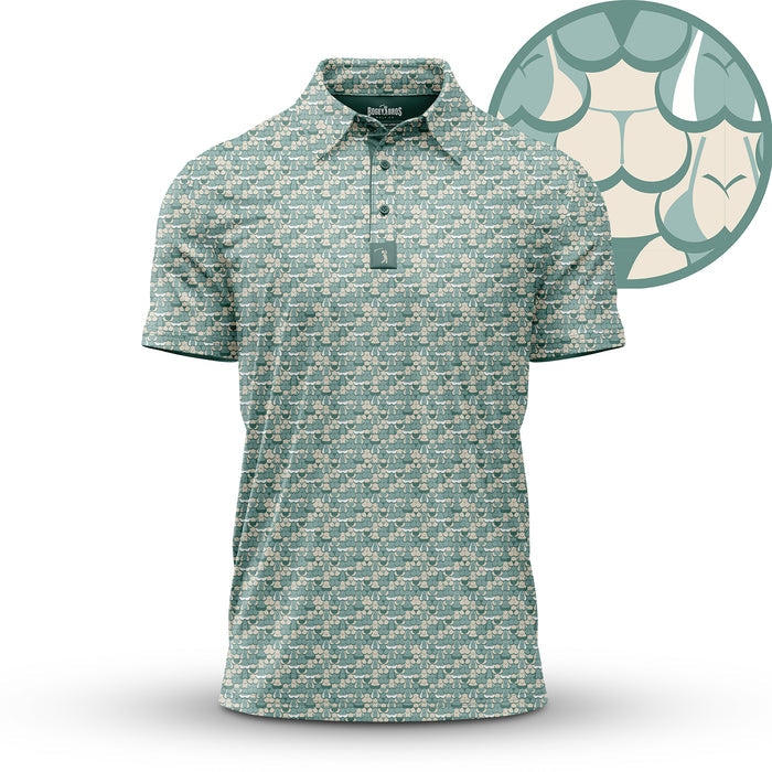 The T&A - Luscious - Polo features a light green color with a repeating stylized pangolin scale and face pattern, athletic fit, pointed collar, buttons, and moisture-wicking fabric. An inset detail shows the intricate scale design up close.