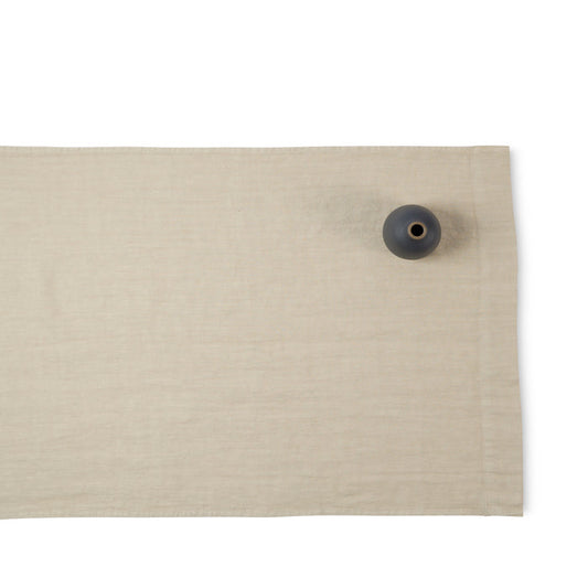 R+D.LAB tela runner in beige linen with heath ceramics bud vase in indigo