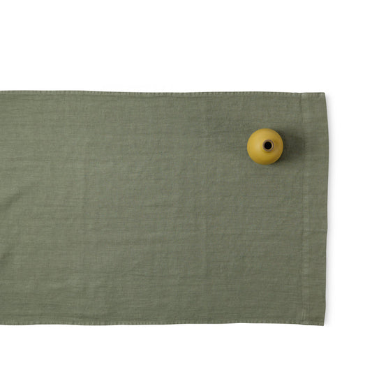 R+D.LAB tela runner in green linen with heath ceramics bud vase in calendula