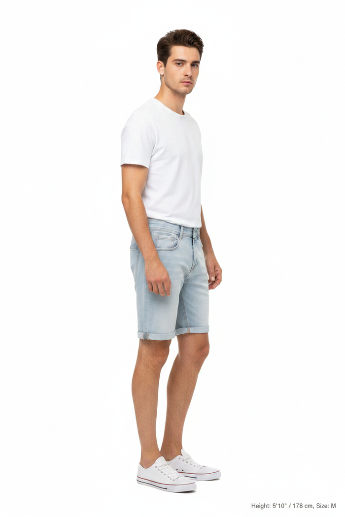 Side profile - Yevan Light Blue Denim Shorts on model